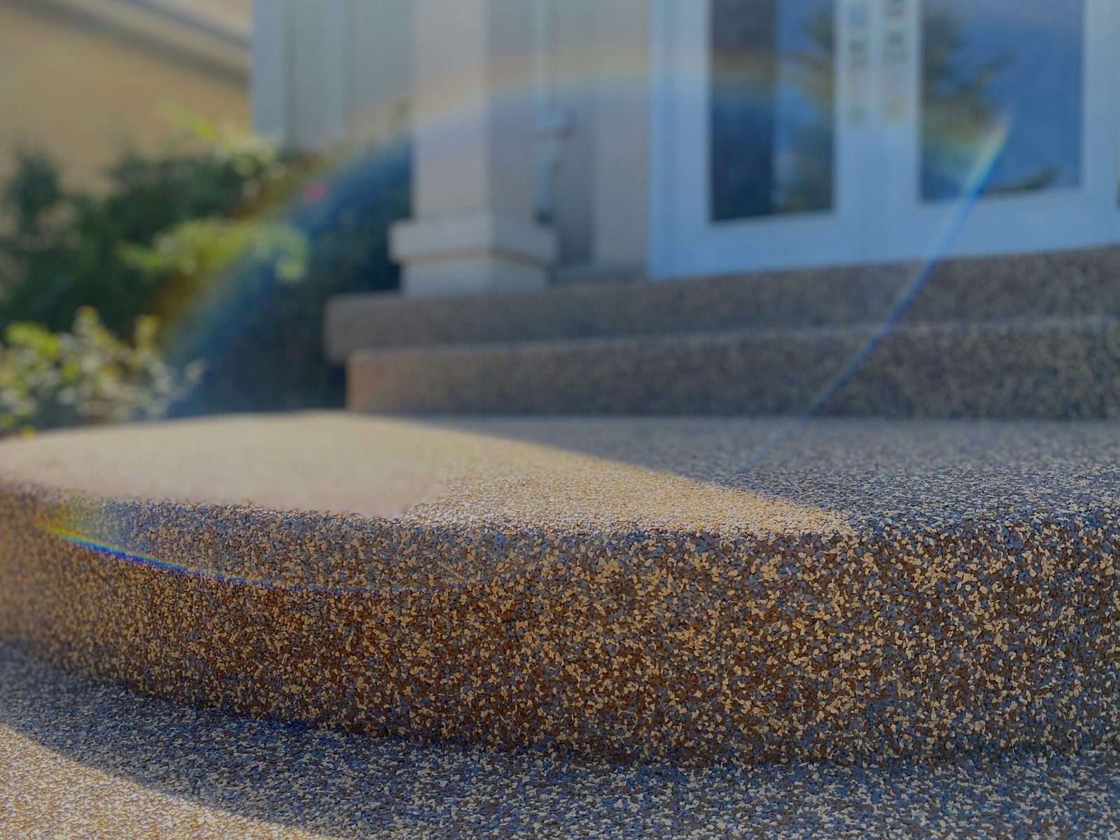 Rubaroc surfacing across a private patio and leisure area