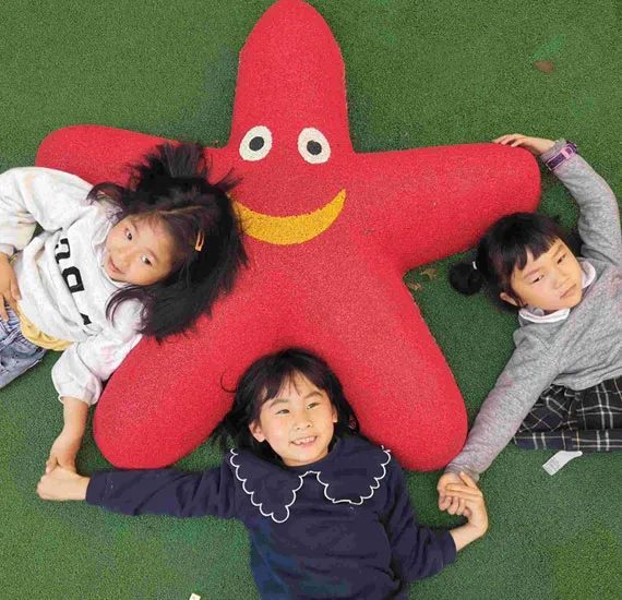 Children playing around a red starfish Colorful 3D EPDM Graphic