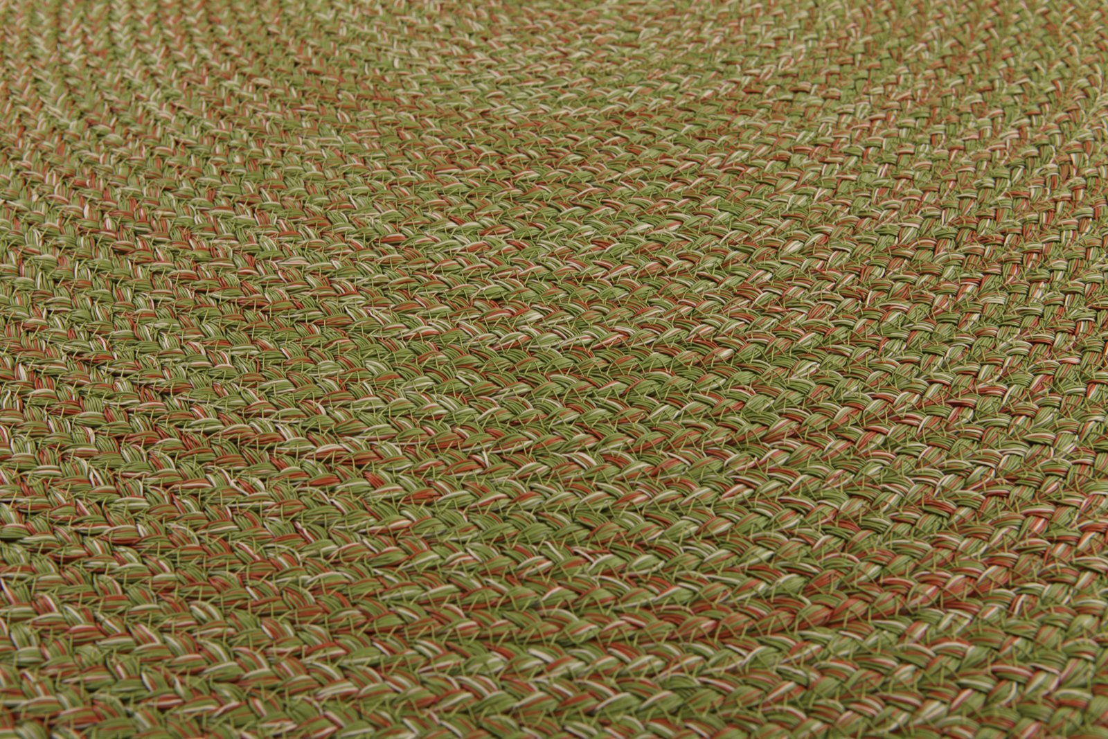 Spiral braided round rug weave close-up at angle