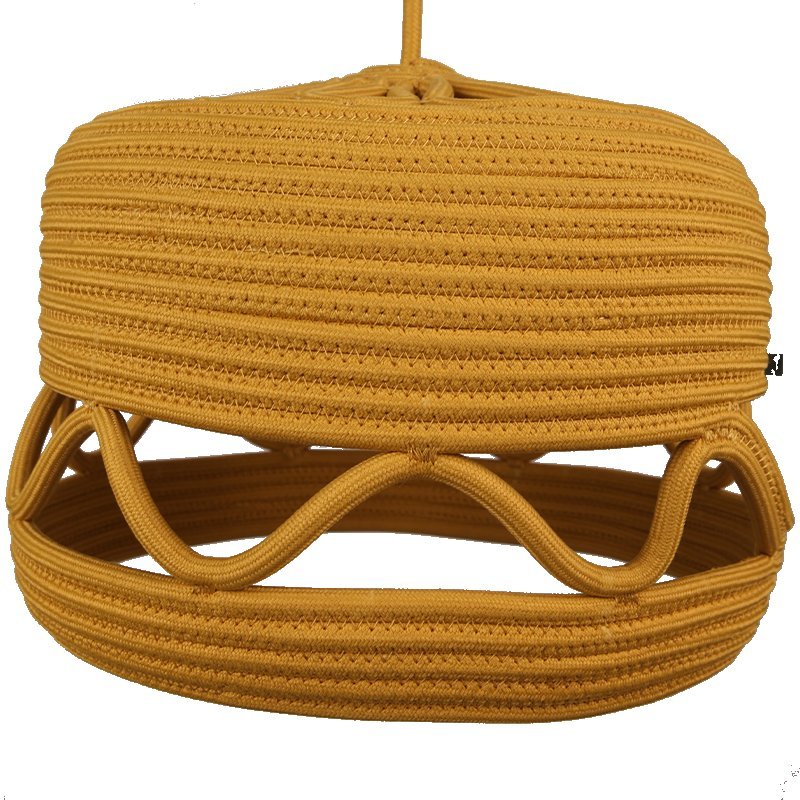 Unlit full drum silhouette in solid mustard yellow rope webbing