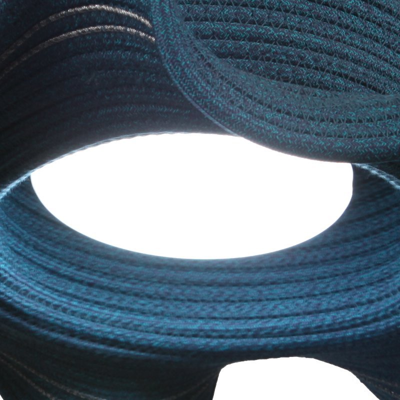 Soft glow filtering through the rope weave of the lampshade