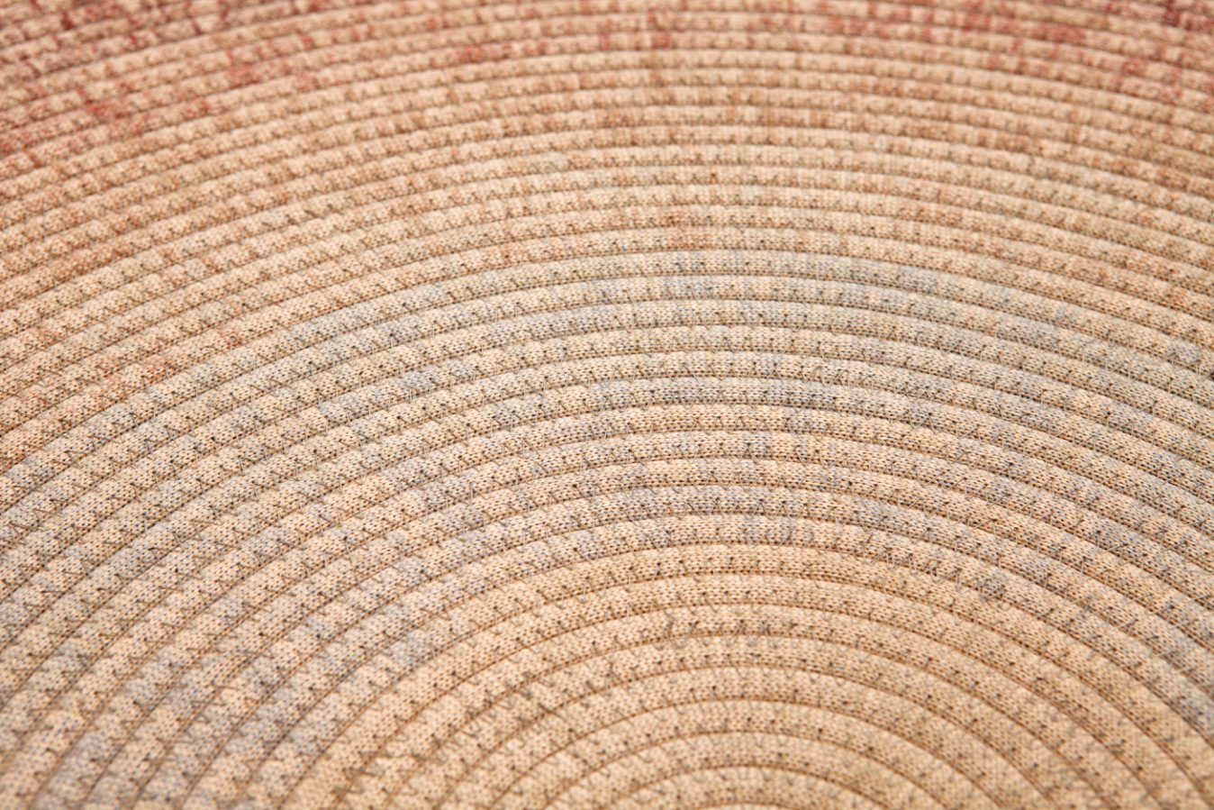 Macro view of the dense braided cords of the rug