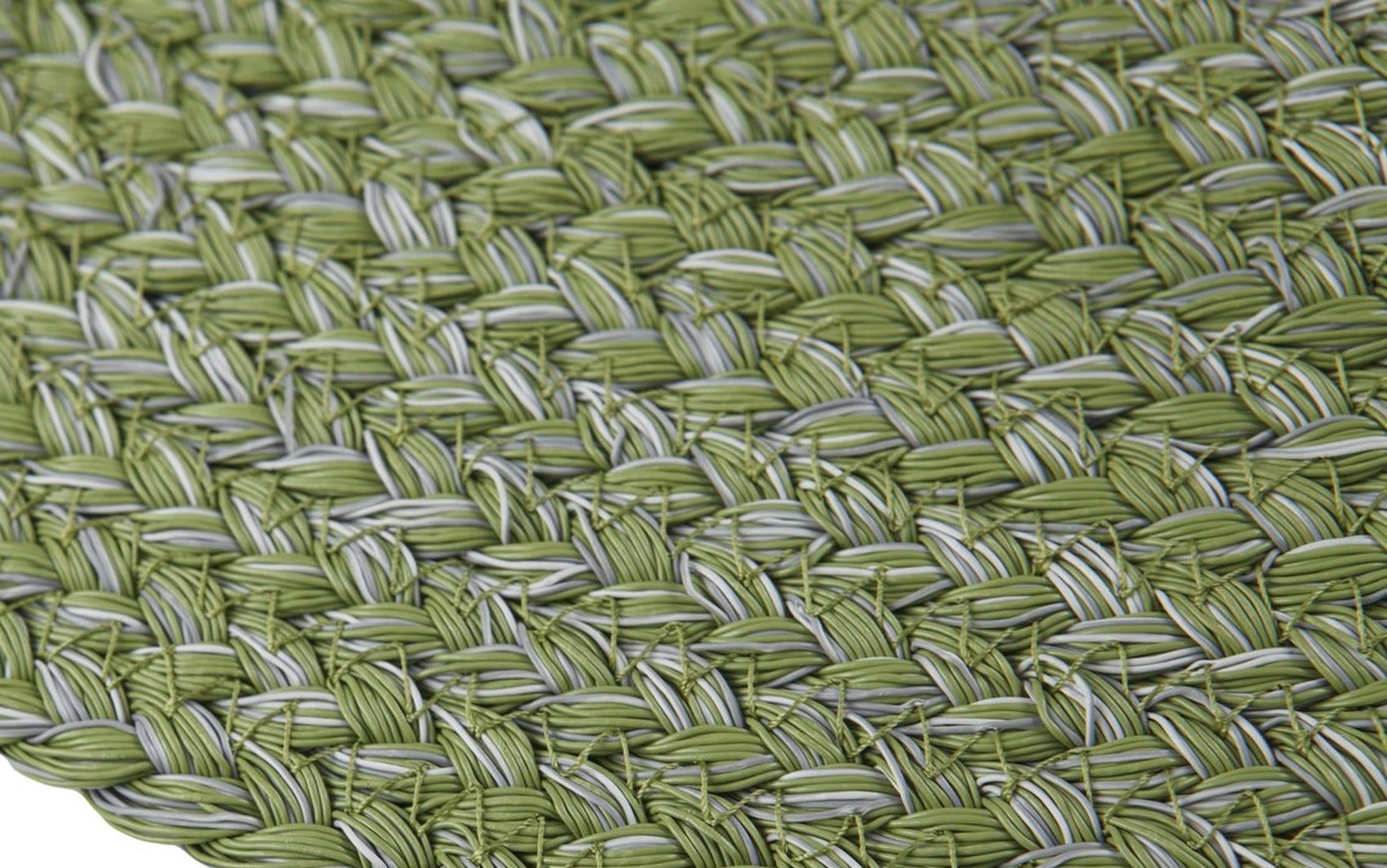 Bound edge detail of the round rope rug showing the stitched coil row