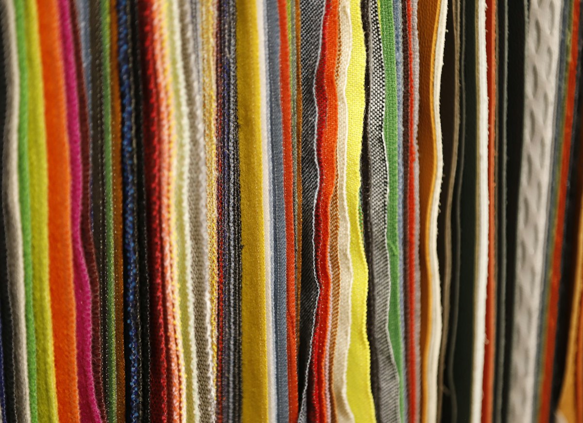 Rows of colorful textured fabric samples