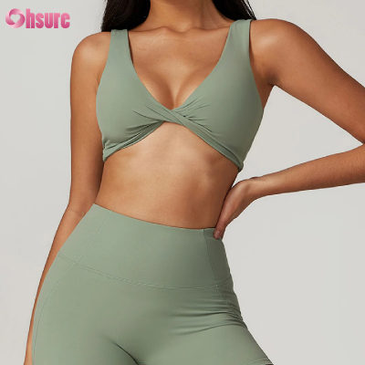 Custom Stylish Gym Bra Manufacturer | Women's Sexy Cross Front and Back Sports Bras Fitness Workout Padded Buttery Soft Gym Bra Deep V-Neck Nylon High Support Yoga Bra OEM Supplier