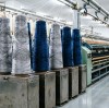 Fibras recicladas y de origen biológico en la ropa de trabajo: Creación de un programa de tejidos trazables para licitaciones de la UE