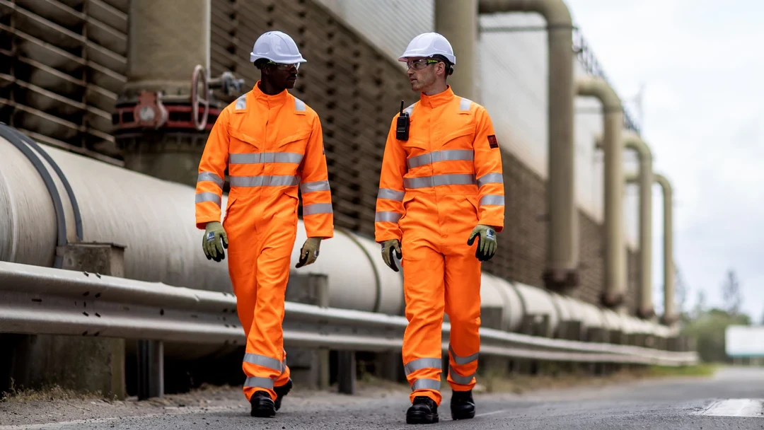 Worker in industrial setting with fire