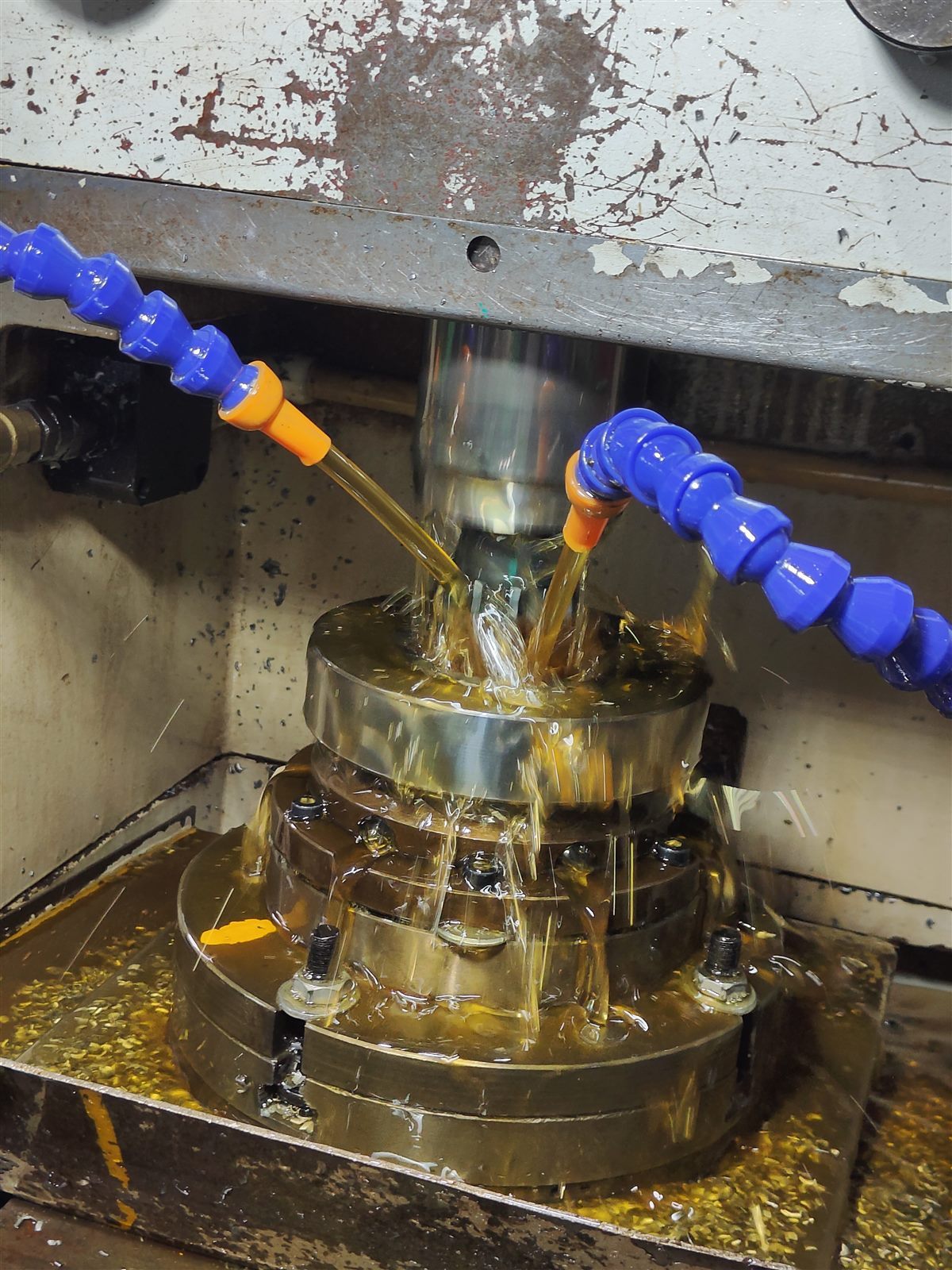 Gear shaping operation with coolant delivery
