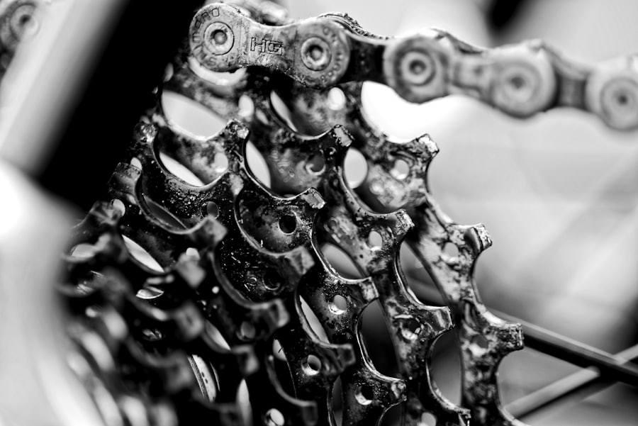Close view of a bicycle chain running over sprocket teeth
