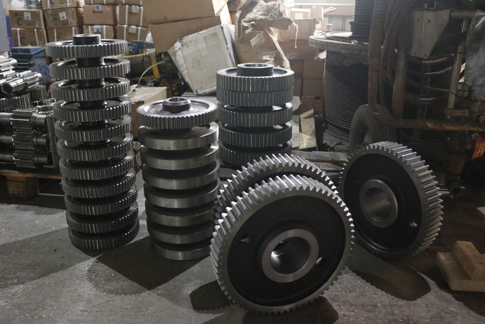 Machined steel gears in an industrial workshop