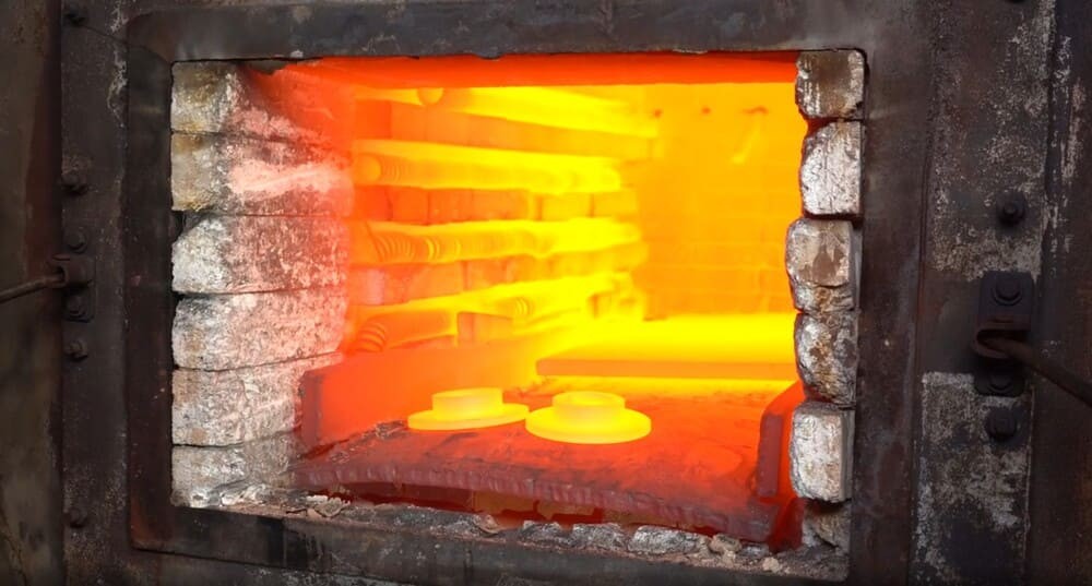 Steel gear wheels during industrial heat treatment