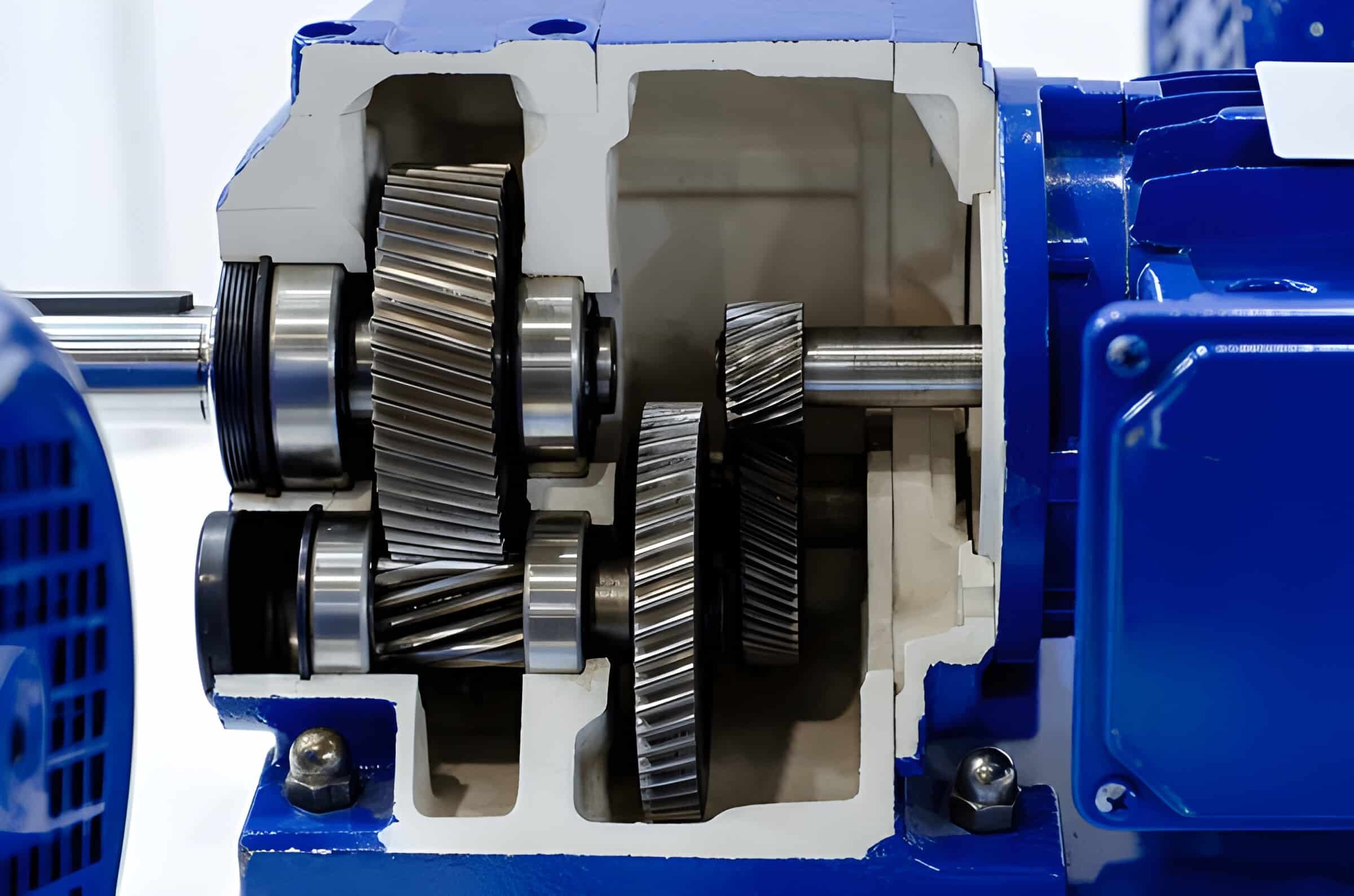 Open industrial gearbox showing helical gear geometry