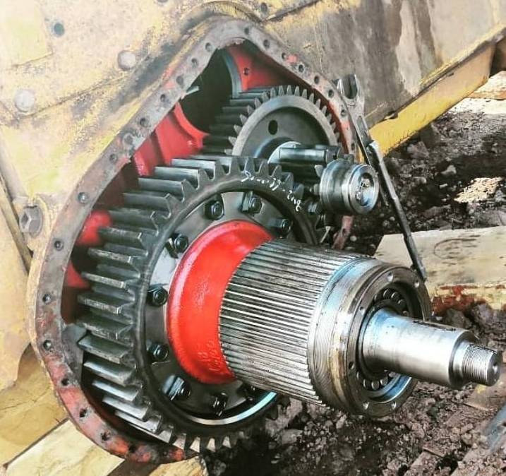 Heavy construction final-drive gearbox opened for inspection