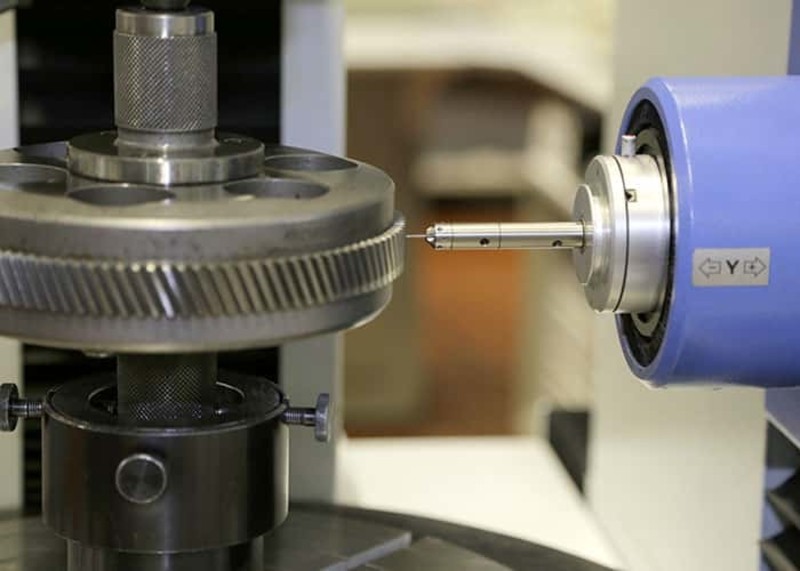 Involute gear measurement machine checking a tooth profile.