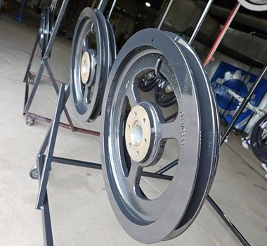 Surface finishing and coating for custom belt pulleys