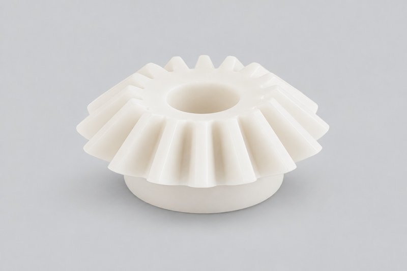 Custom plastic bevel gears with conical tooth geometry