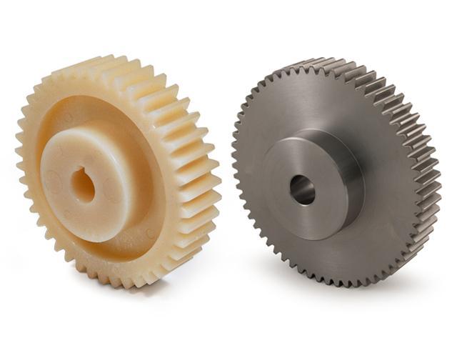 Plastic and metal gears side by side