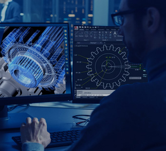 Gear design displayed on engineering computer screens