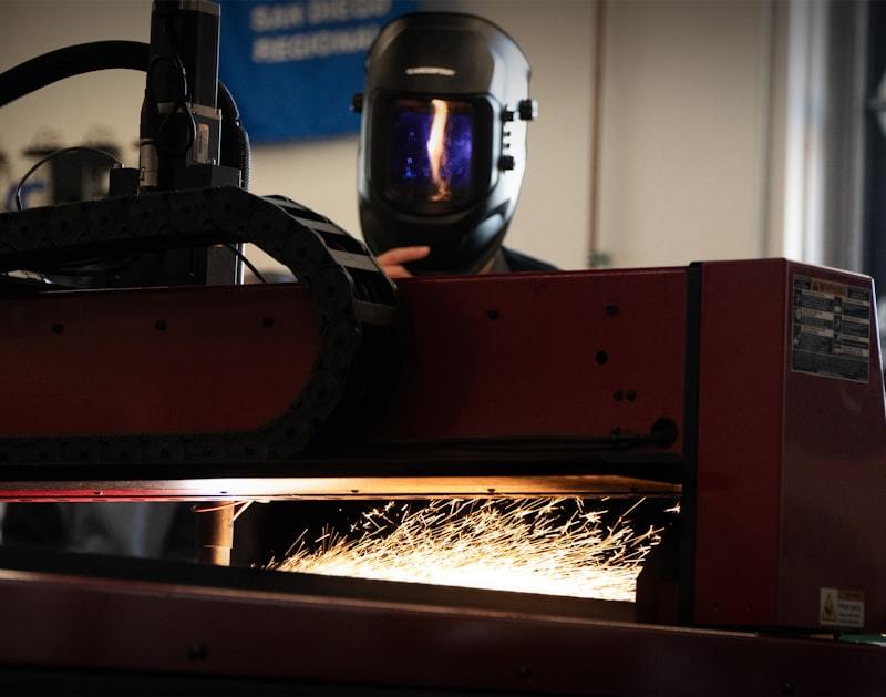 Professional industrial welding operation in modern workshop