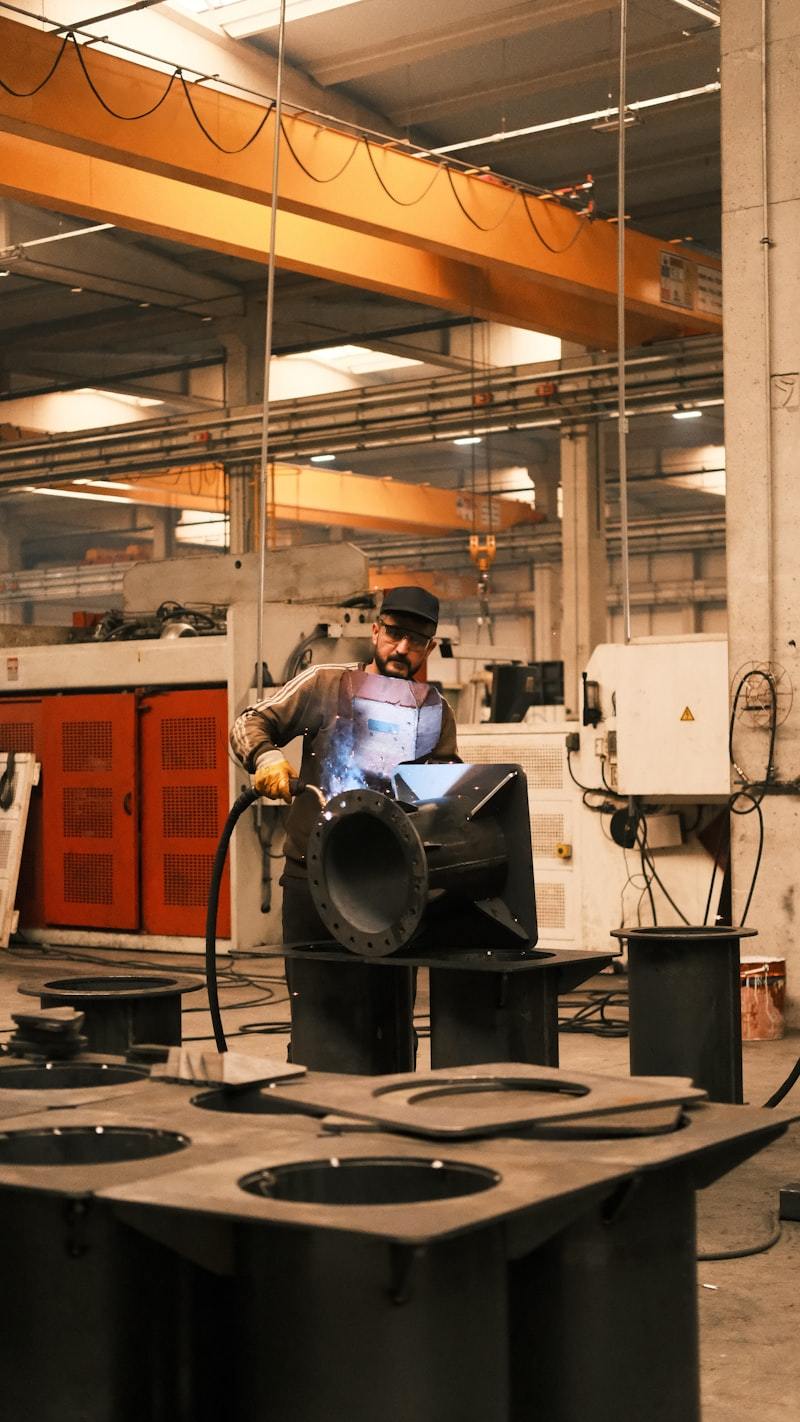 Automated industrial welding machinery in modern smart factory