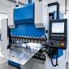 The Ultimate Press Brake Buyer's Guide: Tonnage, CNC Controls & Drive Systems Explained