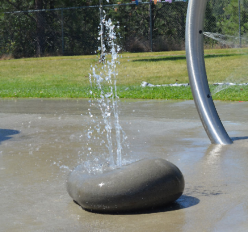 Pebble fountain for water play equipment