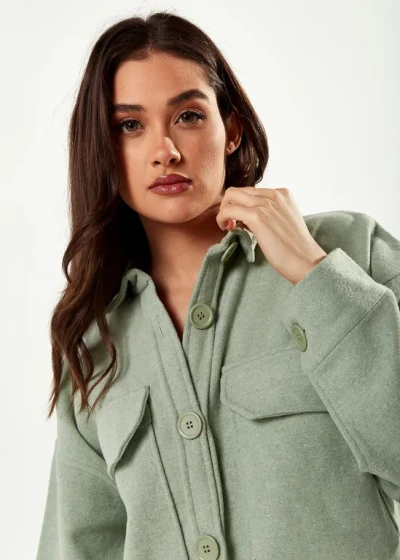 Sample Sport  Eton Neckline  Long Sleeve Solid Color Rectangular Chest Pockets Casual  Tops