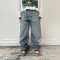 Wholesale Loose Fit Rhinestone Embellished Jeans with Vintage Splatter Design