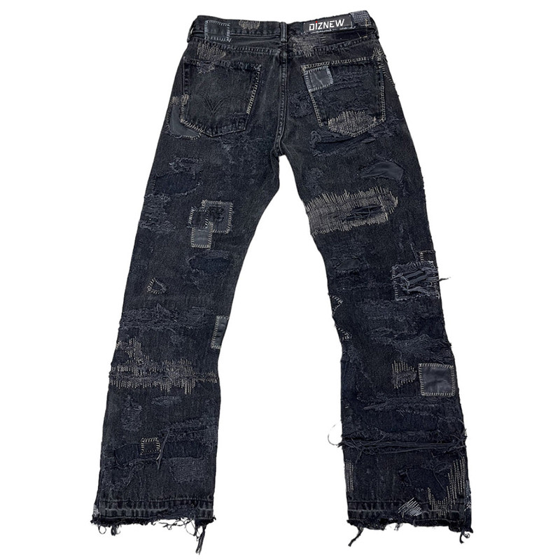 Custom distressed denim jeans