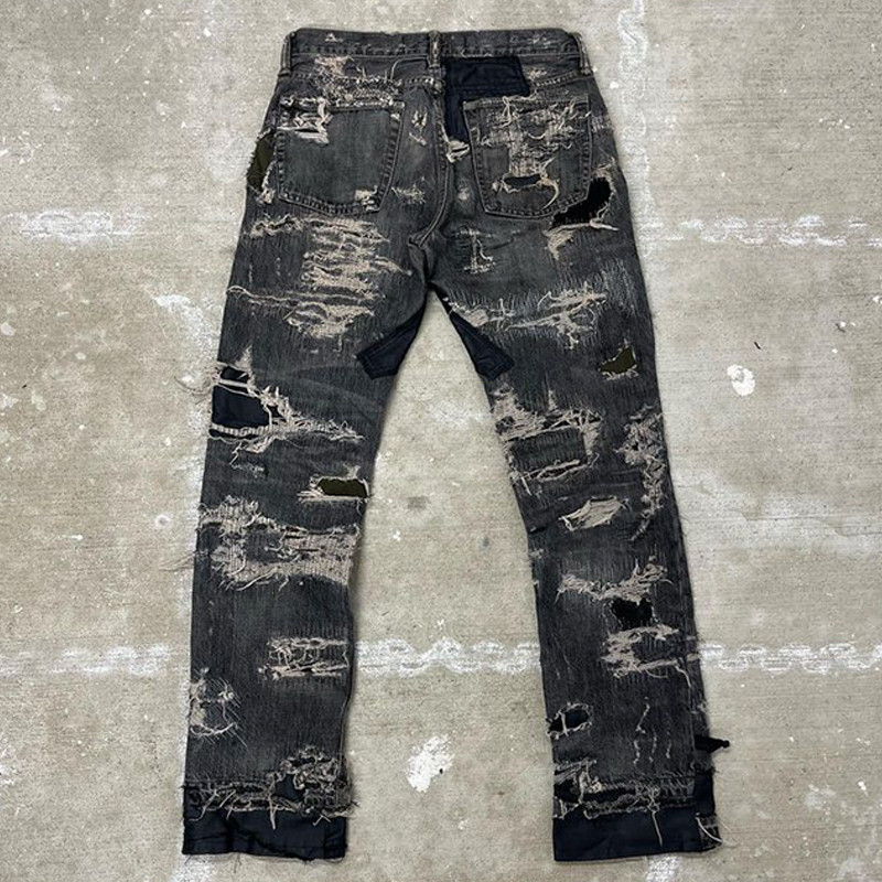 distressed patchwork denim jeans