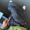 Custom Oversized Rivet-Accented Jeans – Bold Circular Patchwork Design