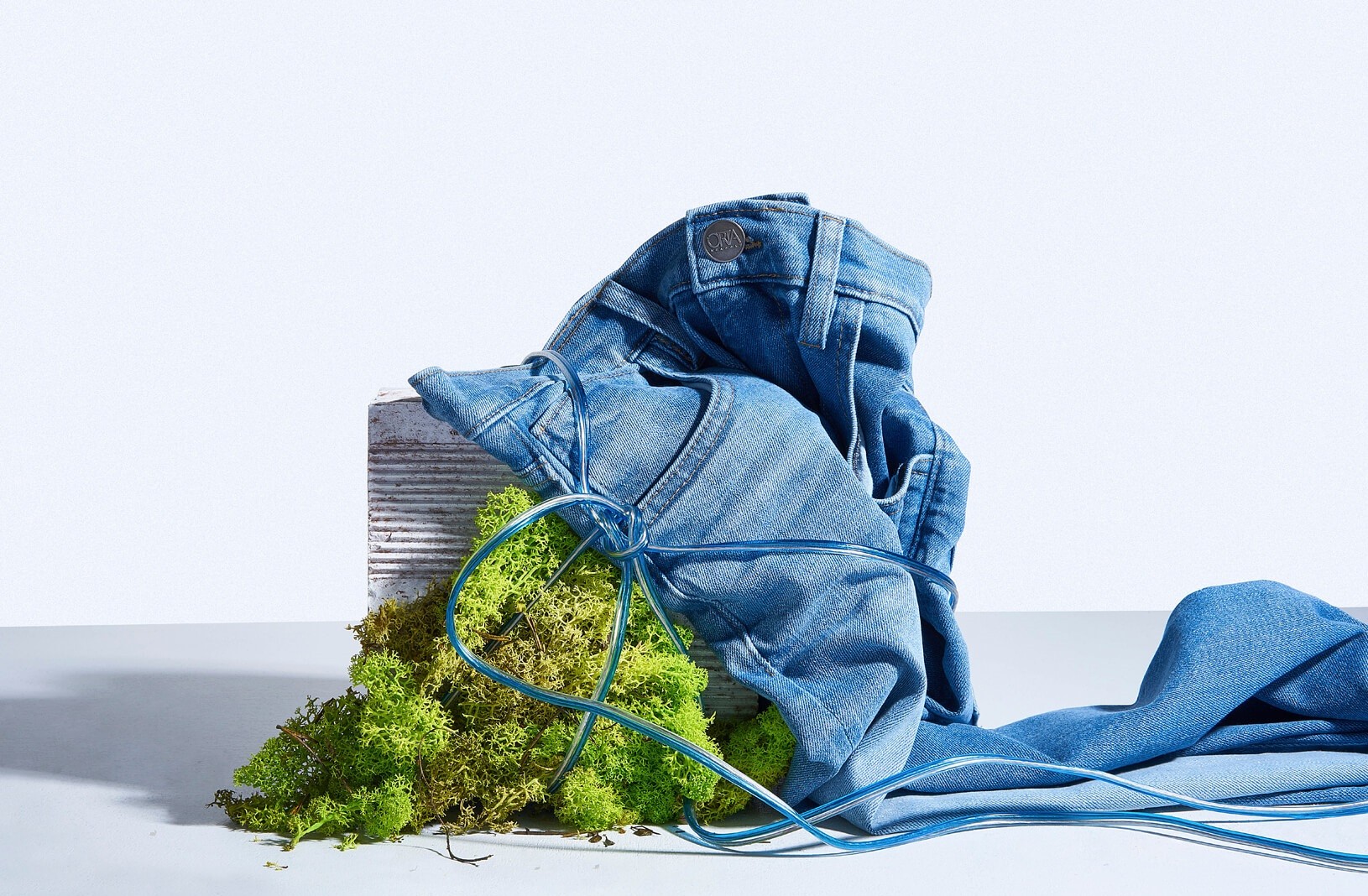 Which sustainable materials and technologies are most commonly used in eco-friendly denim?