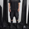 Custom Distressed Black Denim Shorts with Avant-Garde Edge
