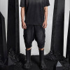 Custom Distressed Black Denim Shorts with Avant-Garde Edge