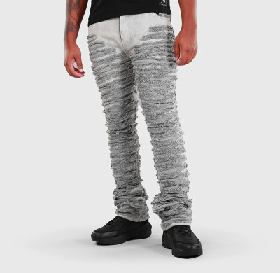 Custom All-Over Shredded Stacked Jeans – Avant Streetwear Statement