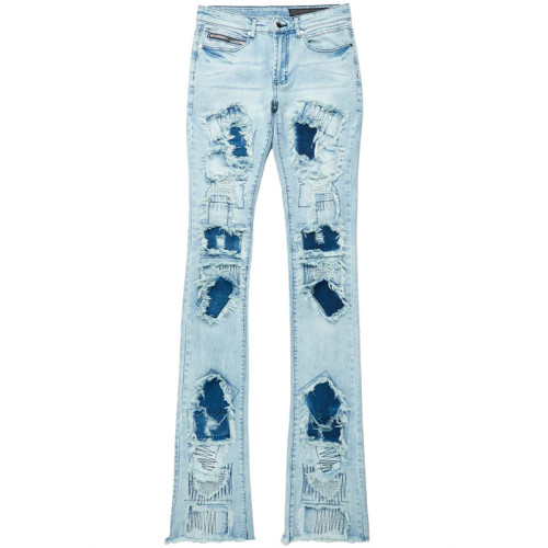 Custom Flared Distressed Patch Jeans in Light Wash Denim
