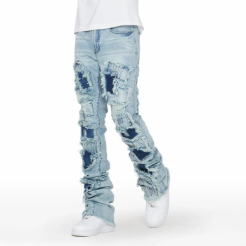 Custom Flared Distressed Patch Jeans in Light Wash Denim