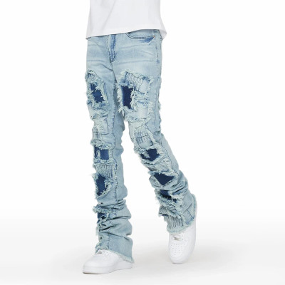 Custom Flared Distressed Patch Jeans in Light Wash Denim