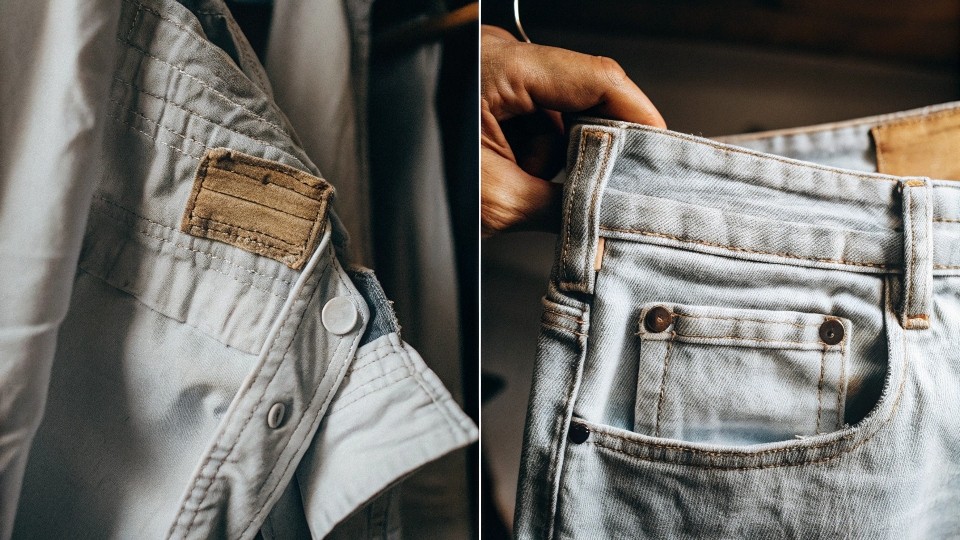 A split image showing a vintage 'Made in USA' Levi's label next to a modern 'Made in Vietnam' label.