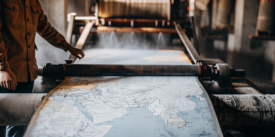 A map of Southern China highlighting the key denim manufacturing cities of Xintang, Zhongshan, and Yulin.