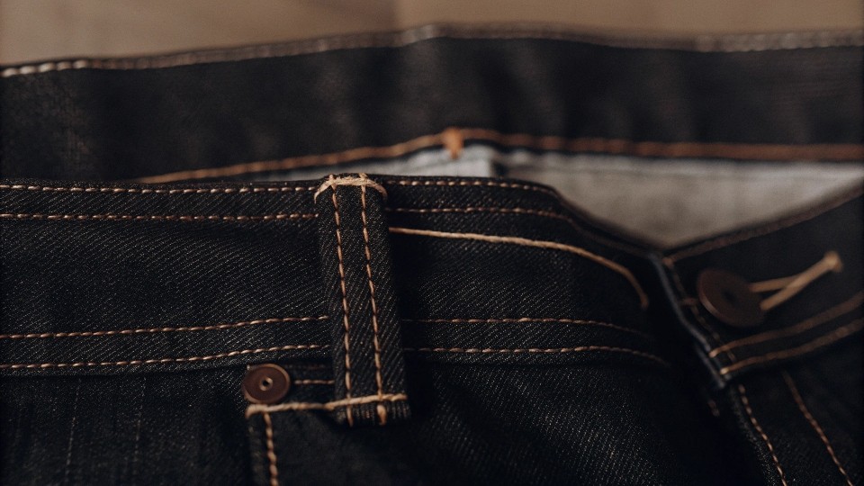 Denim stitching is crucial because it is the literal architecture holding the garment together under constant stress.