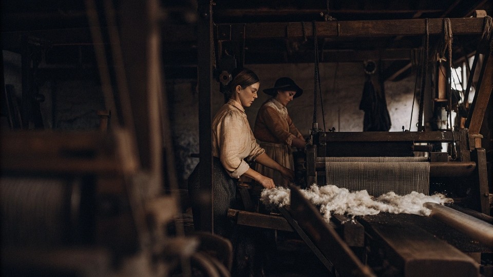 Before the Industrial Revolution, the lack of mechanized looms, reliable cotton processing, and durable stitching techniques made the production of denim fabric inefficient and costly. Only with 19th-century advances in spinning, weaving, and global cotton trade could denim be mass-produced affordably.