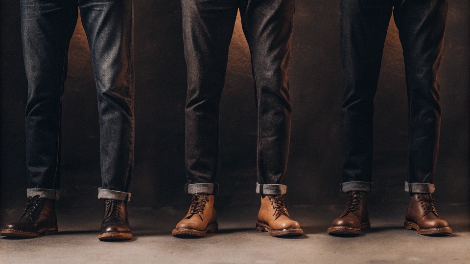Leg length depends on style and shoe choice: a slight break (touching the shoe with a small crease) is classic for straight and slim cuts