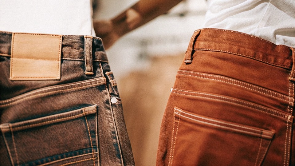 Whodescidewar is positioned as a premium contemporary denim label emphasizing distinctive washes, trend-forward fits, and higher-end materials.