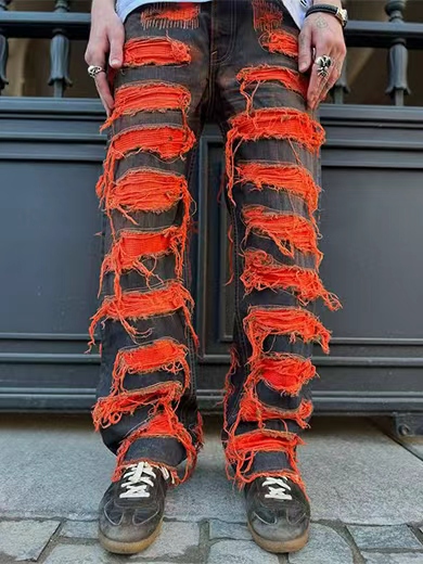 Grey and red patched jeans with holes