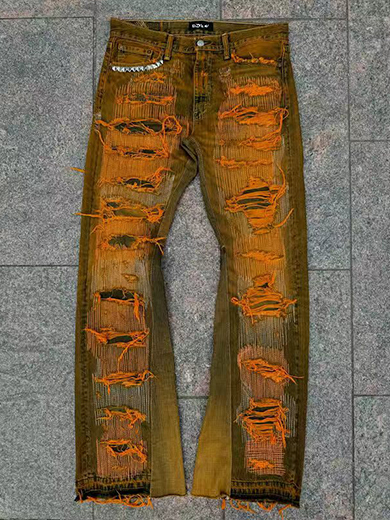 Mud-yellow jeans with holes
