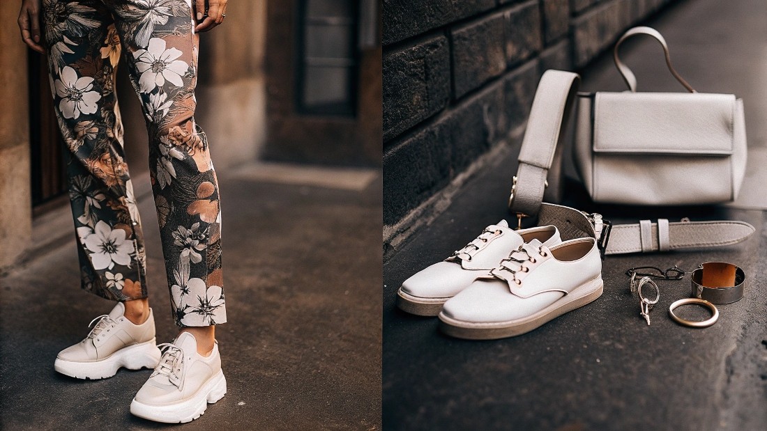 When styling patterned jeans, let your shoes and accessories echo one of the print’s accent hues
