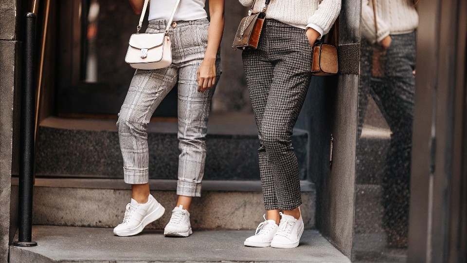 Pair patterned jeans with solid-color basics: white tees, denim shirts, or neutral sweaters