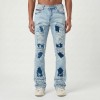 Custom Flared Distressed Patch Jeans in Light Wash Denim