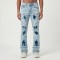 Custom Flared Distressed Patch Jeans in Light Wash Denim